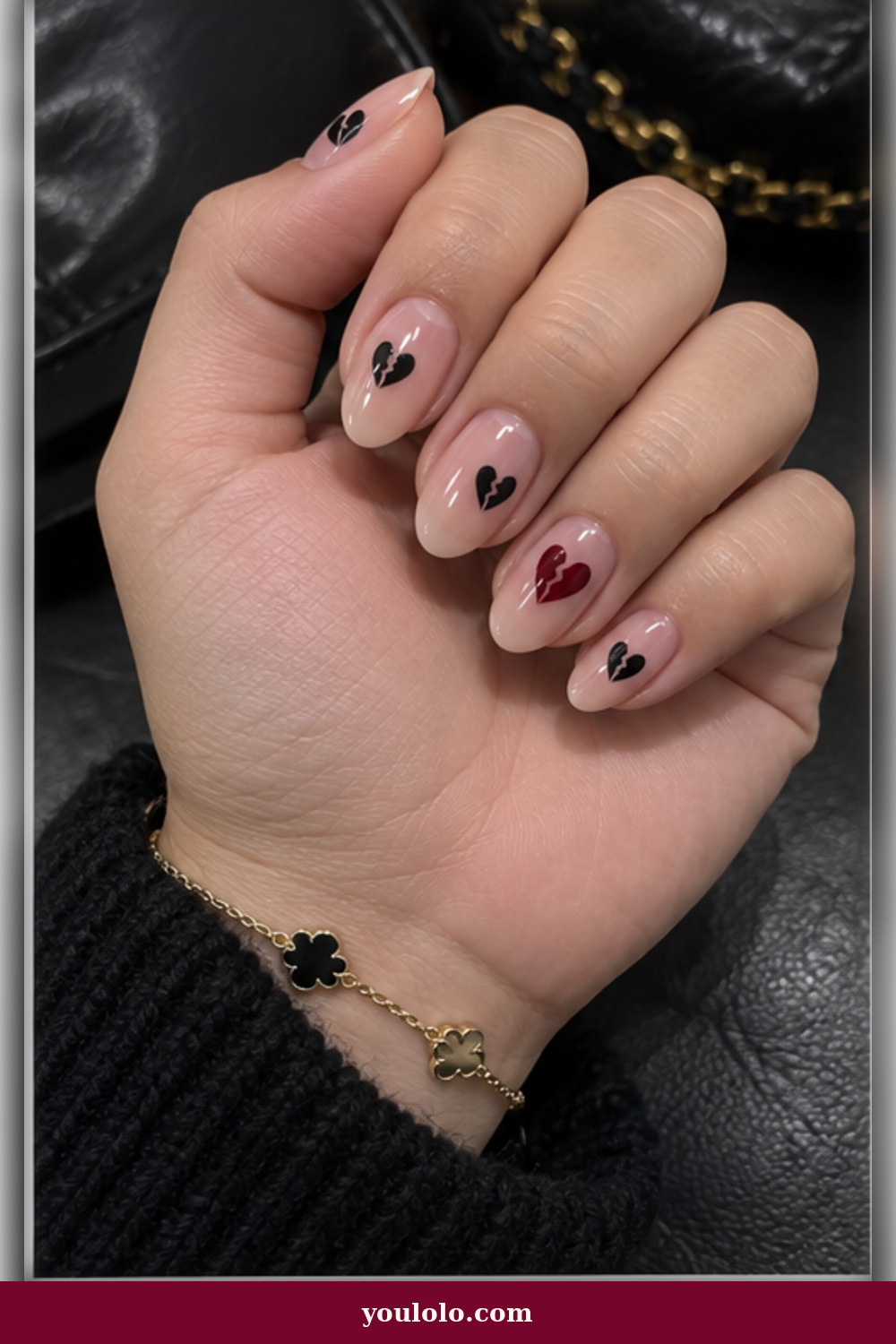 Emo Nails idea 9: soft blush nails with tiny black broken hearts and a wine accent