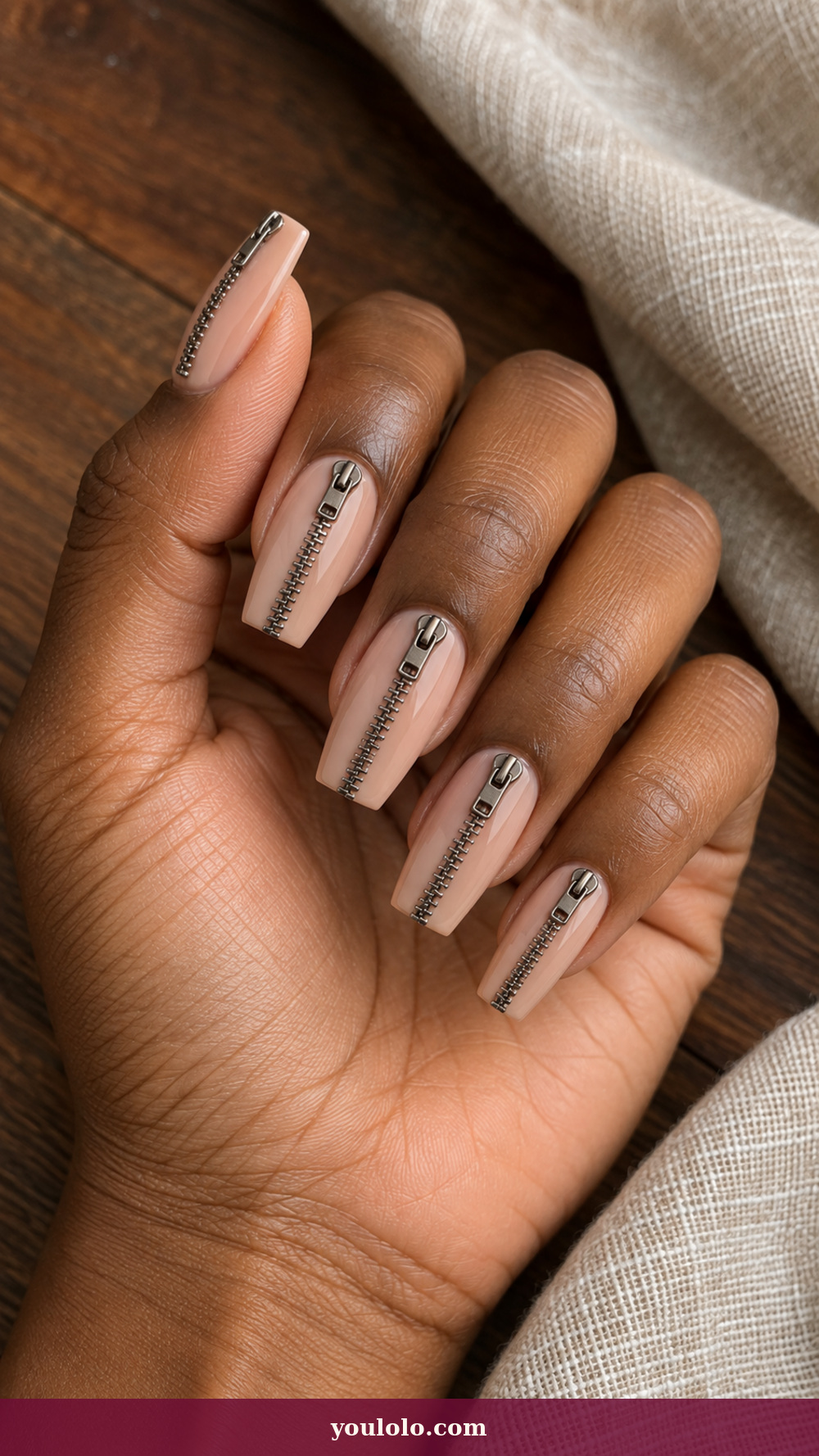 Acrylic Nails Ideas idea 9: Gunmetal Zipper Line on a realistic feminine hand