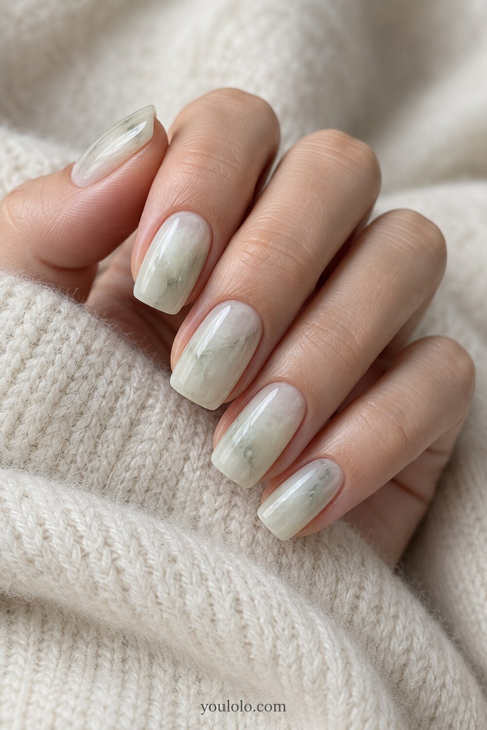 Milky pale green glazed manicure with jade translucency