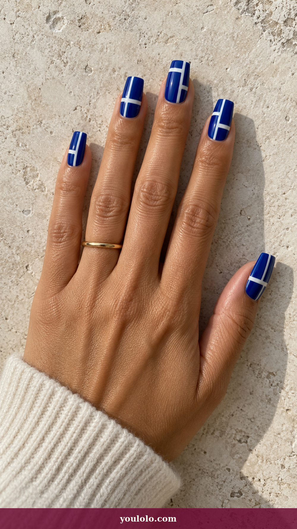 Blue and White Nails idea 9: Ultramarine Windowpanes on a realistic feminine hand