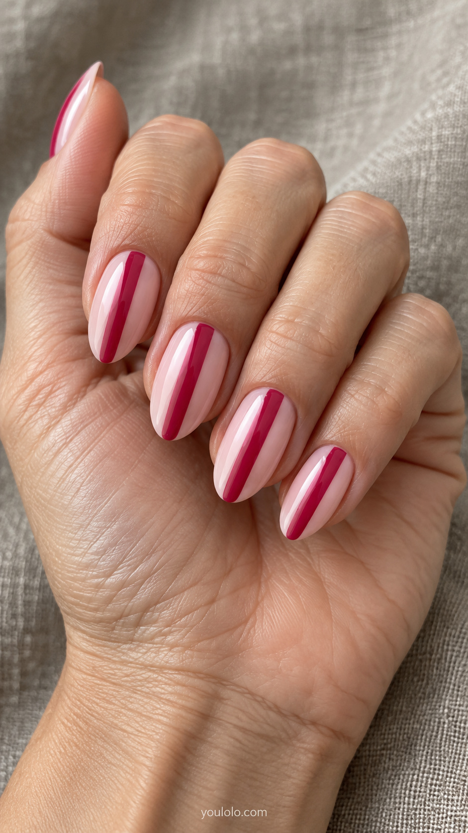 A single raspberry racing stripe manicure