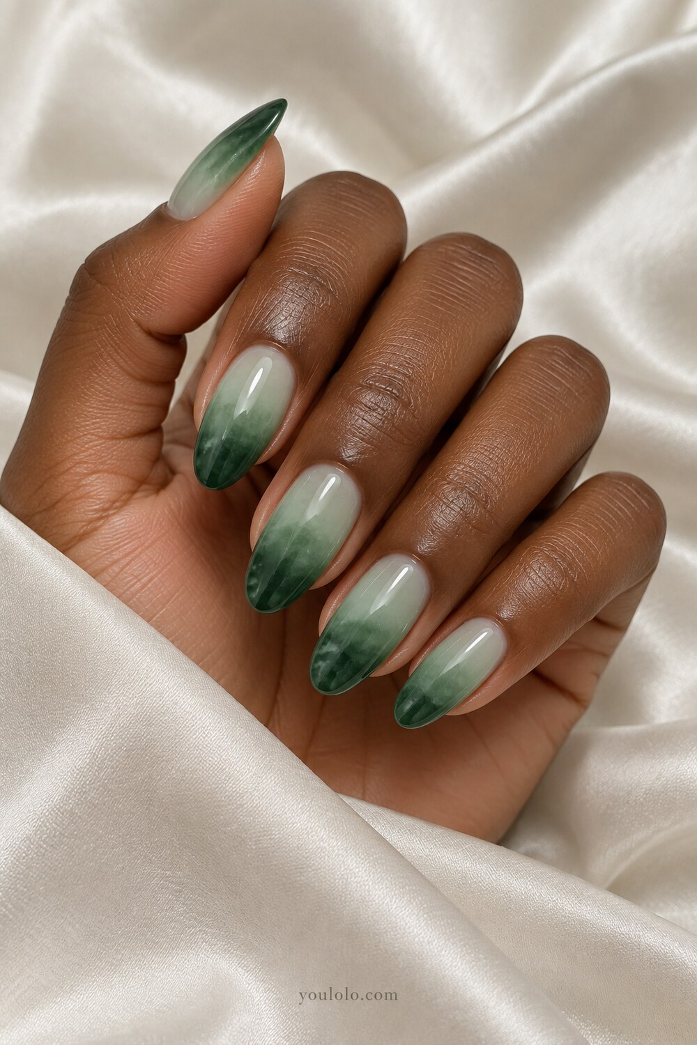 Emerald green aura centers fading into translucent edges