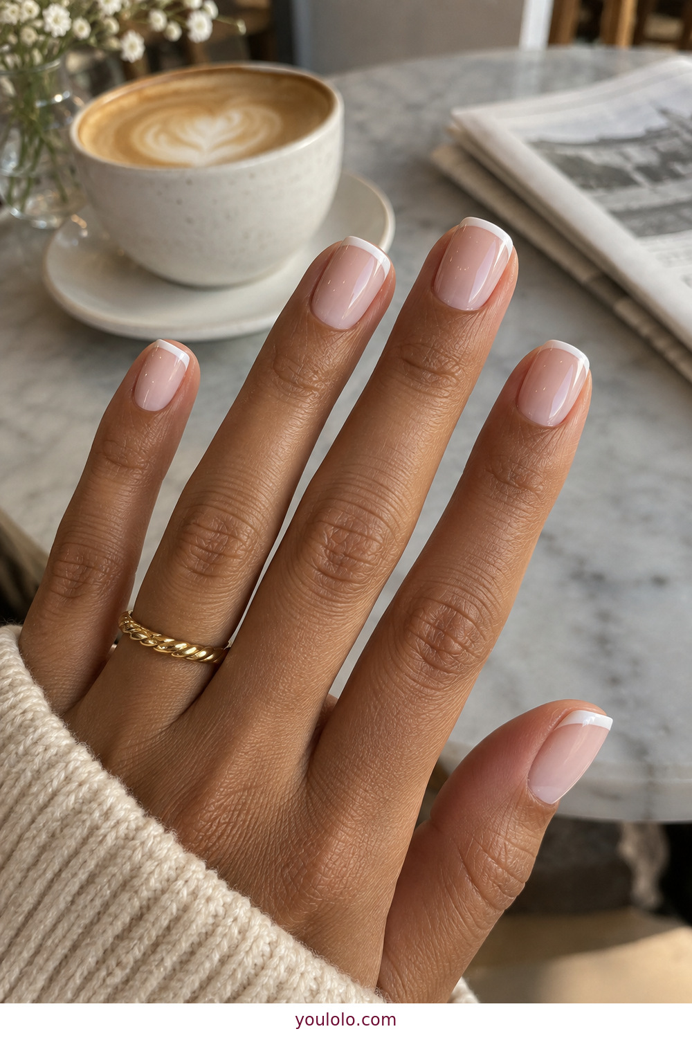Milky white micro French manicure on natural short nails