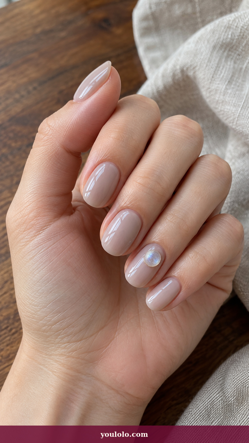 Douyin Nails idea 10: Moonstone Cabochon on a realistic feminine hand