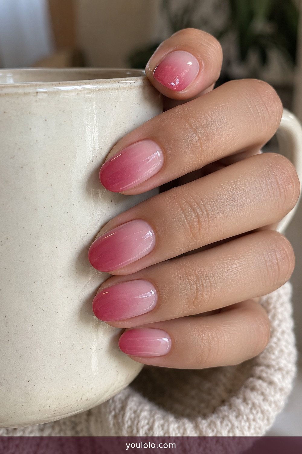 Soft raspberry blush ombre on medium oval nails