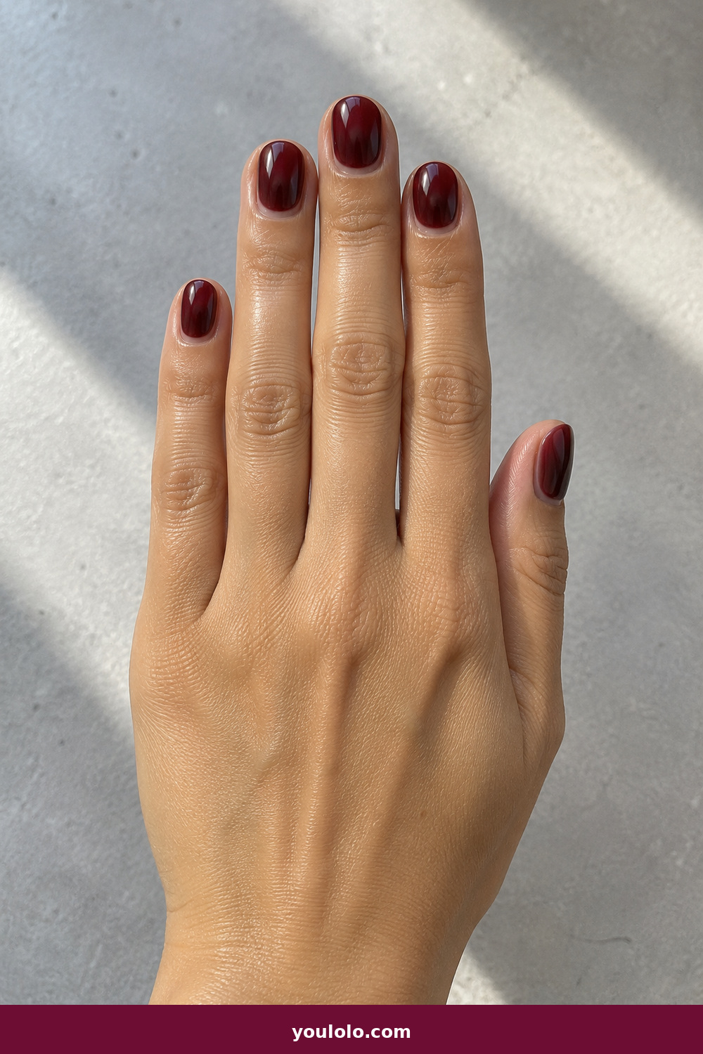 Gel Nails Ideas idea 11: Cherry Cola Aura, short rounded cherry-cola gel with a darker diffused aura center