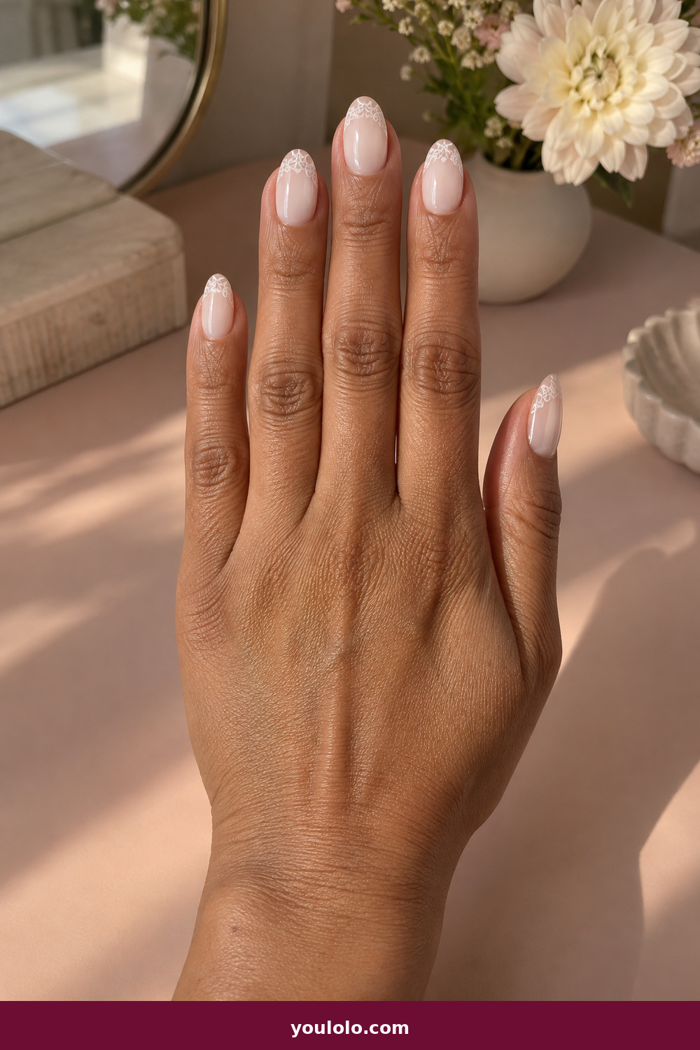 Elegant Almond Nails idea 11: Ivory Lace Edge, medium almond ivory nails with an extremely delicate lace-like edge