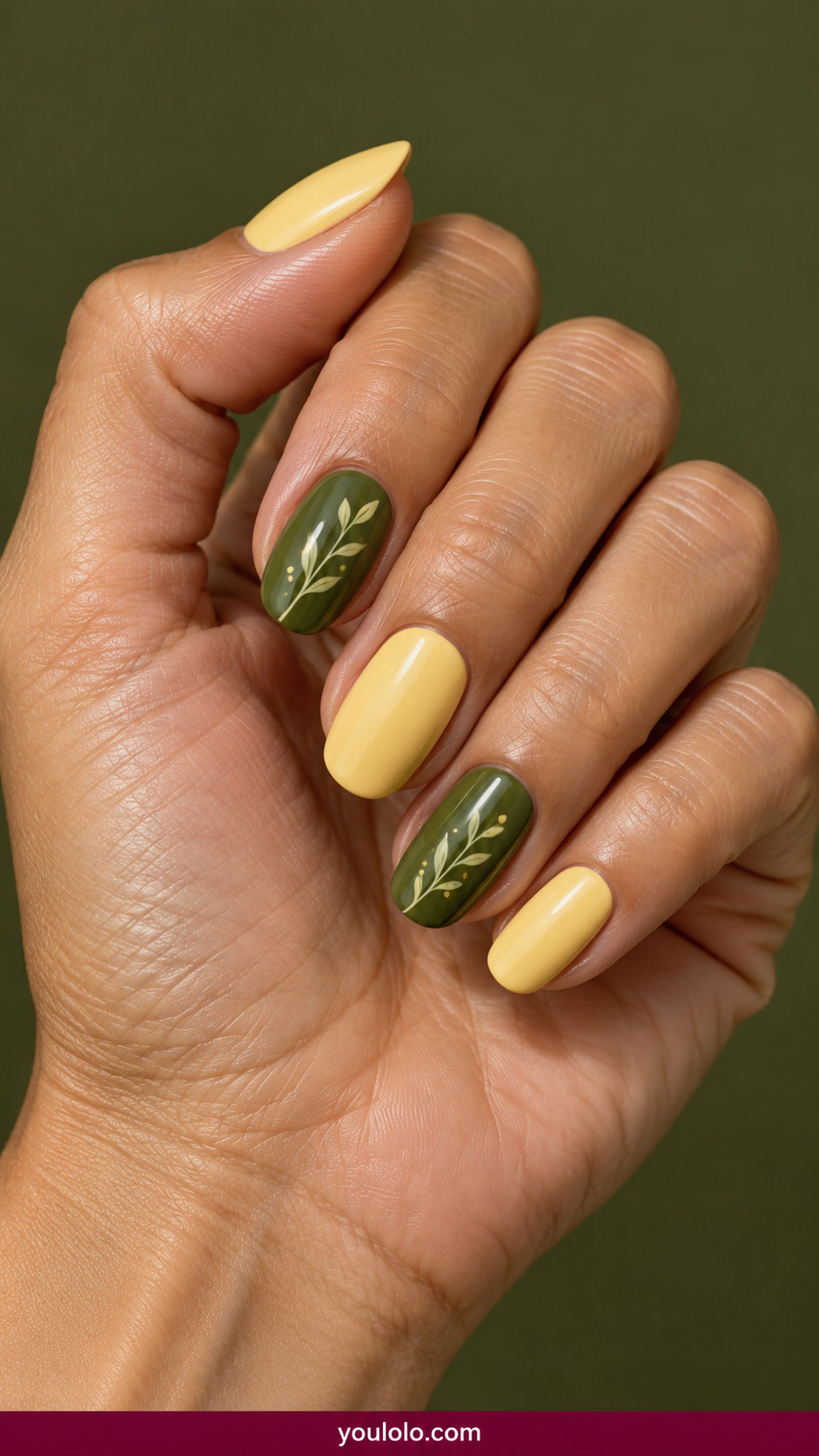 Butter Yellow Nails idea 11: warm butter yellow and olive green alternating accent nails on an anatomically realistic feminine hand