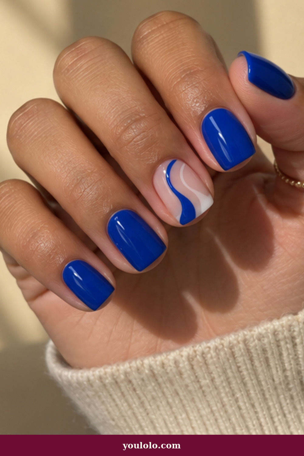 Squoval Nails idea 12: Cobalt Negative-Space Wave