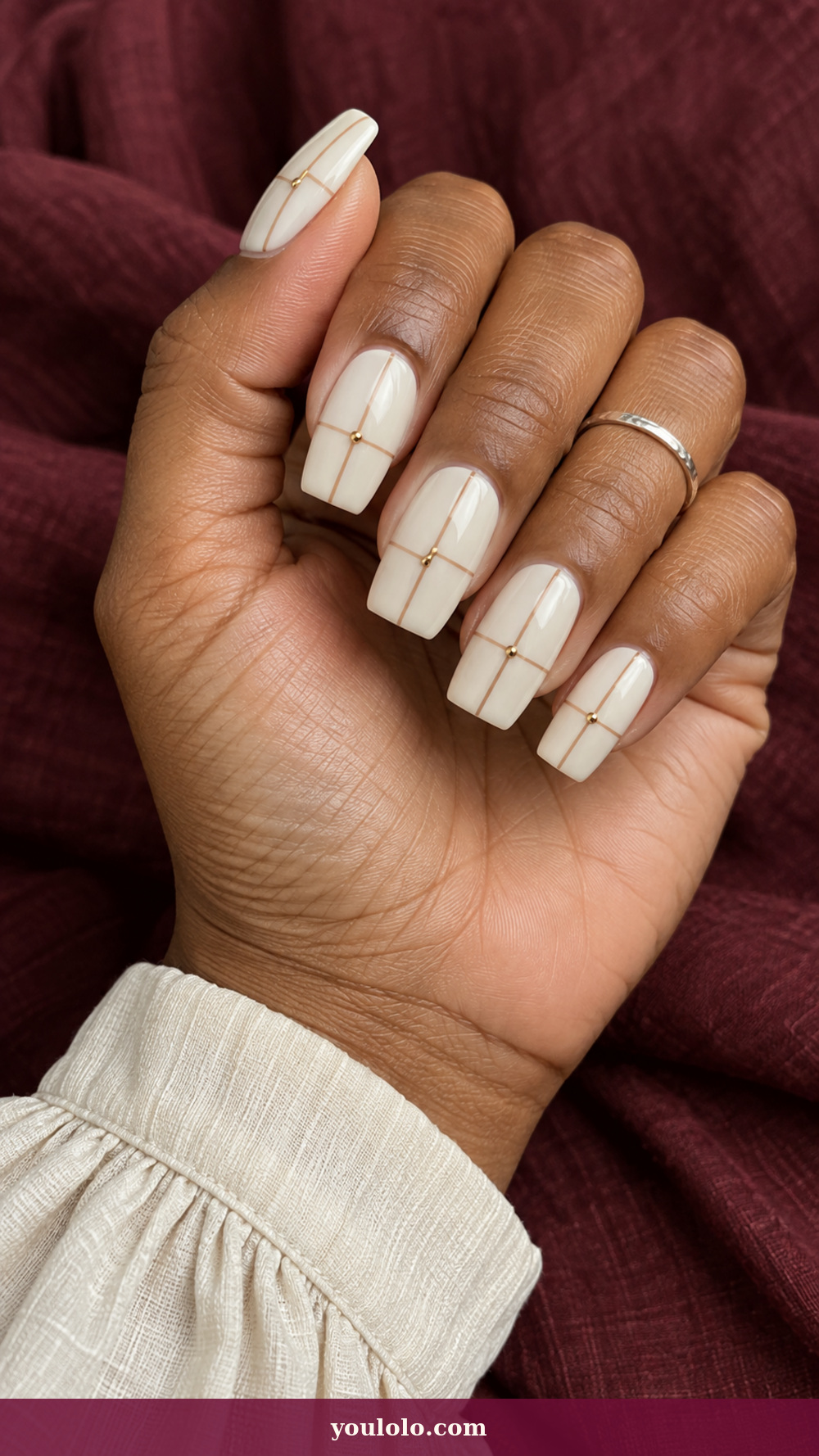 Long Square Nails idea 12: Cream Pinboard Grid on a realistic feminine hand