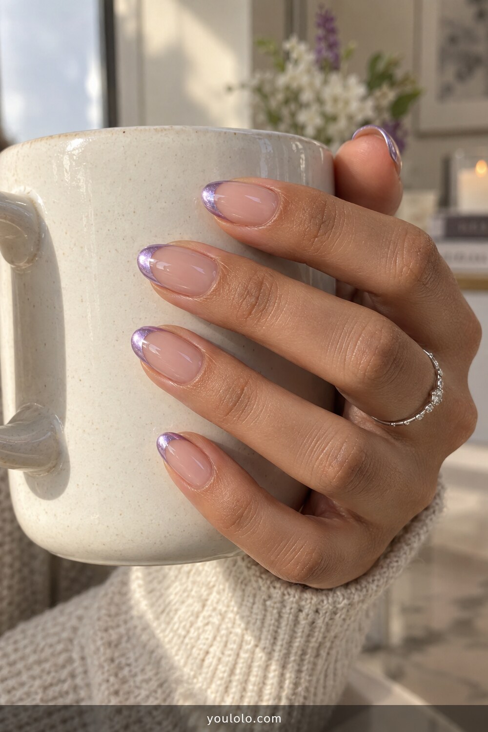 Lilac chrome French tips over a natural pink base