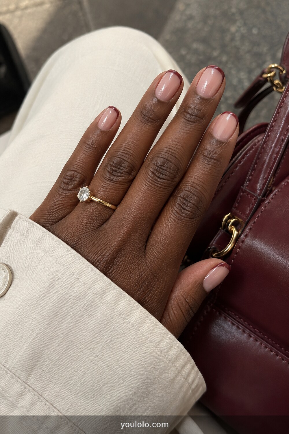 Muted berry French tips on short natural nails