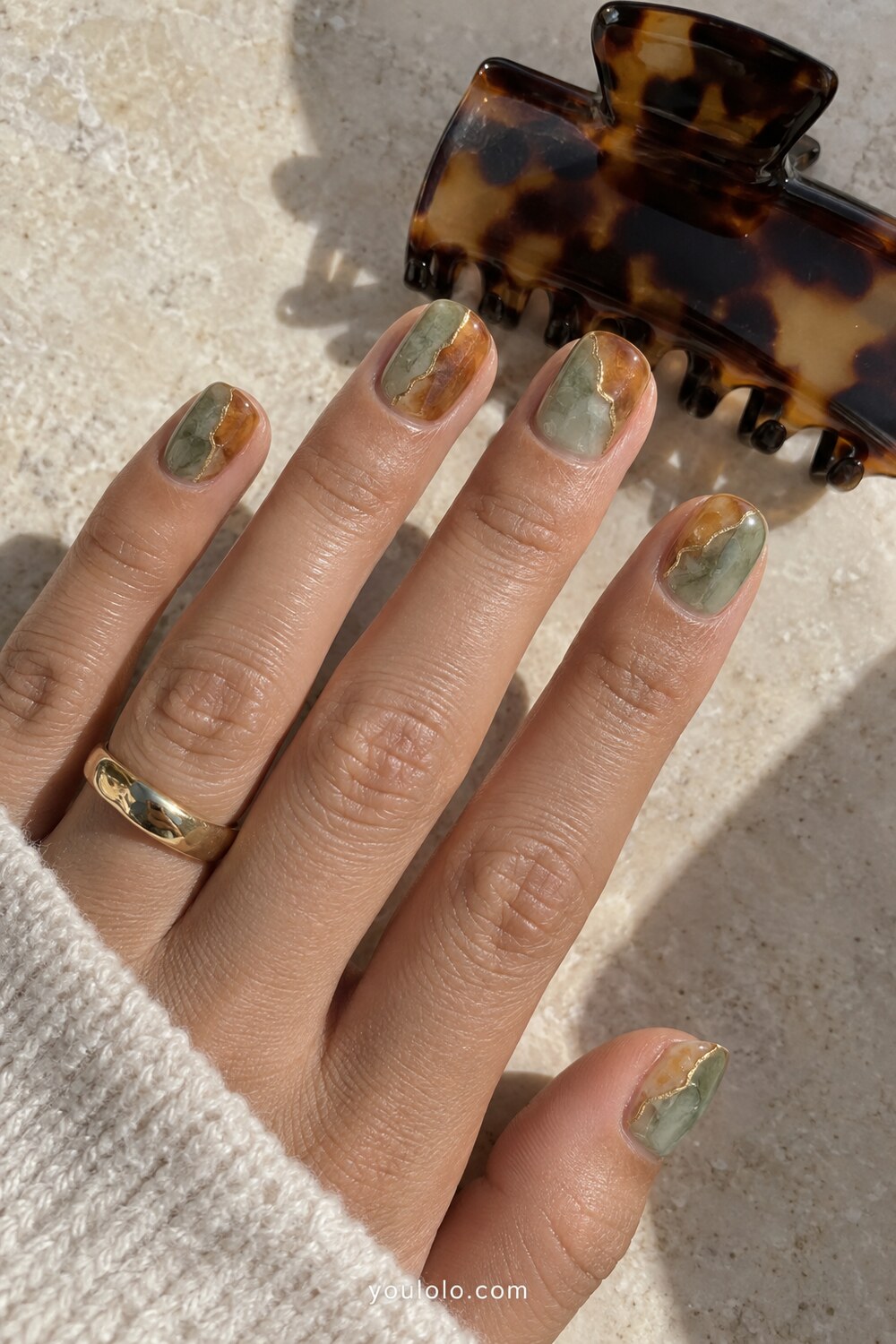 Translucent green and warm quartz marble manicure