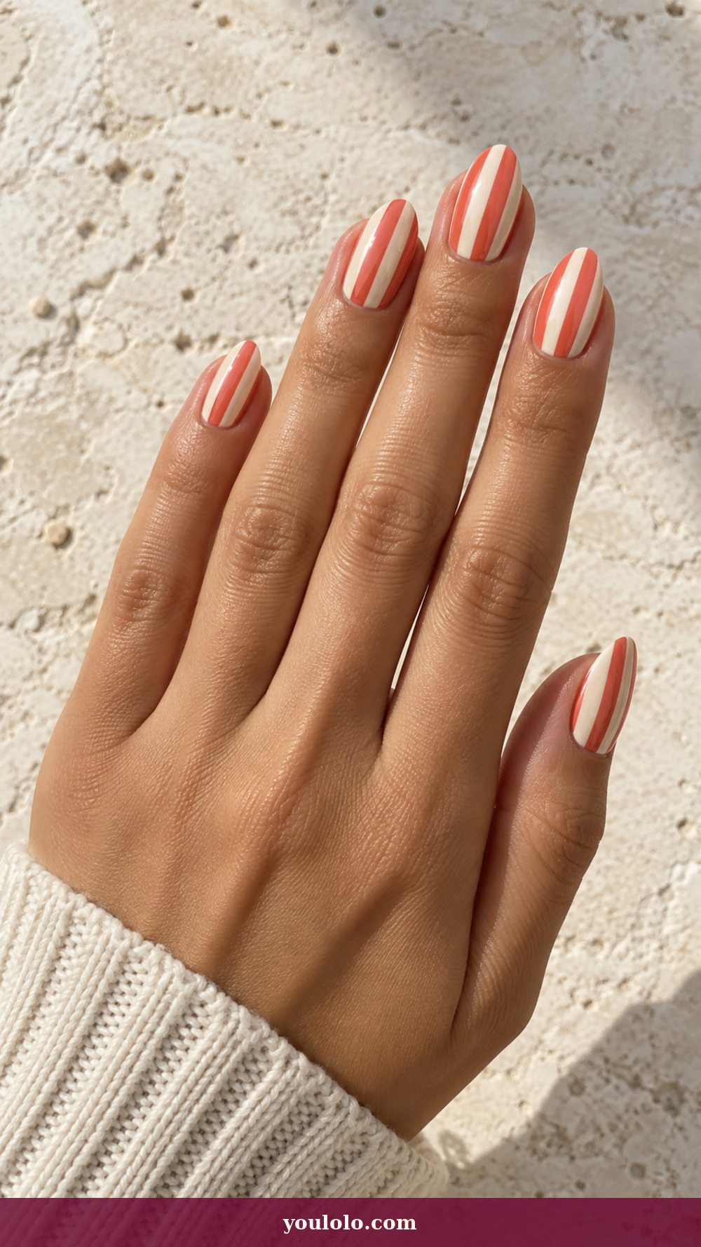Italy Nails idea 13: Capri Umbrella Stripes on a realistic feminine hand