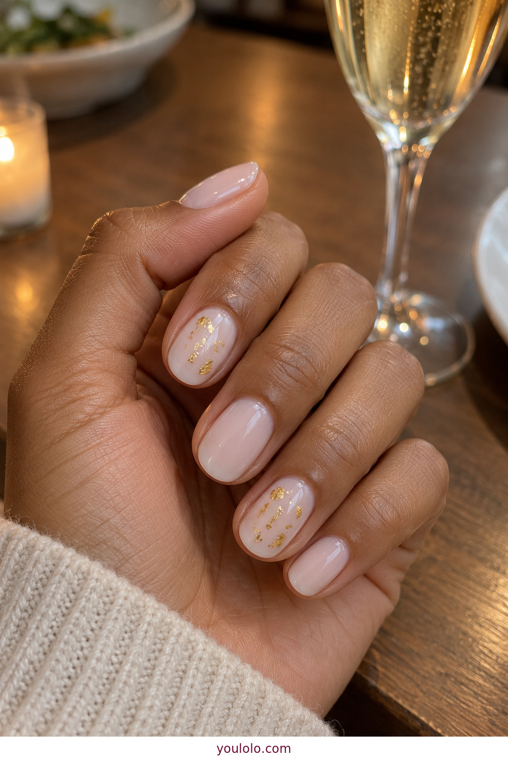 Milky white short nails with sparse embedded gold foil