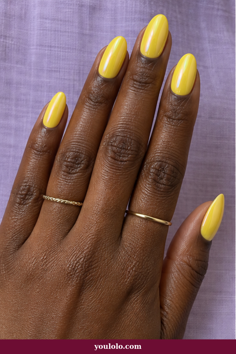 Lemon Nails idea 13: glossy lemon yellow almond nails with pearl chrome wash