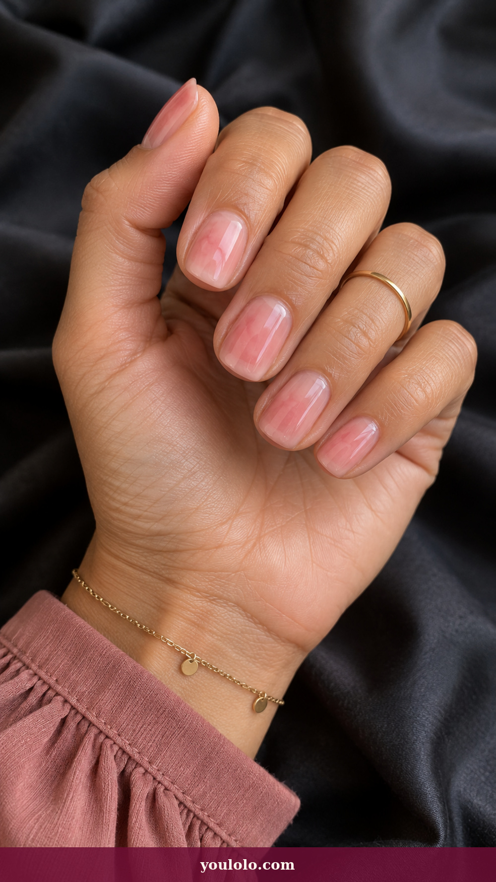 Simple Spring Nails idea 13: Petal Pink Wash on a realistic feminine hand