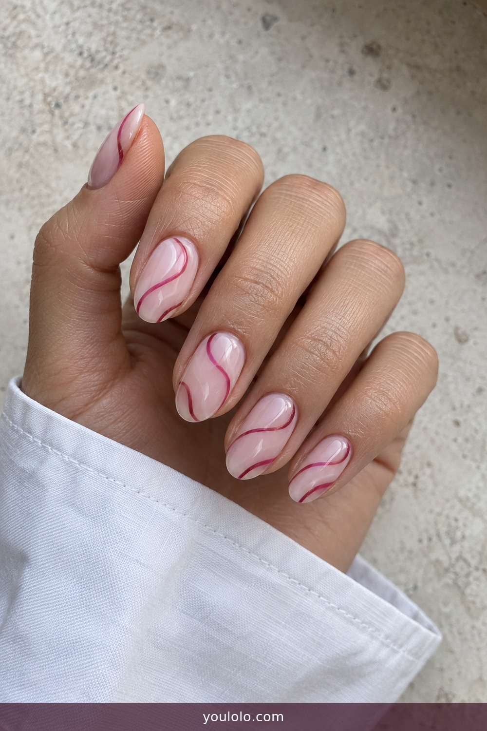 Sheer nails with hand-painted raspberry swirl lines