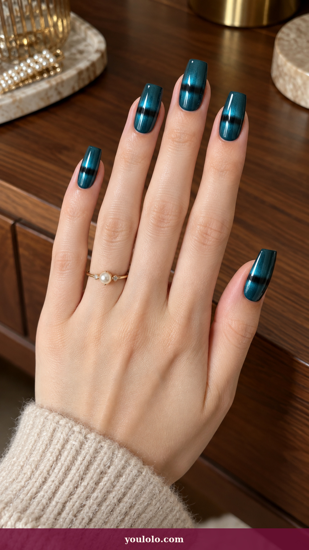Long Square Nails idea 13: Teal Compression Bands on a realistic feminine hand