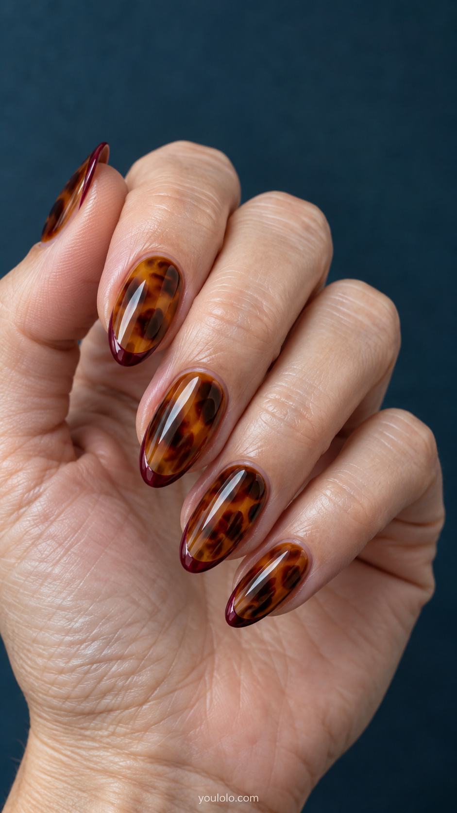 Amber nails with burgundy outlined tips manicure