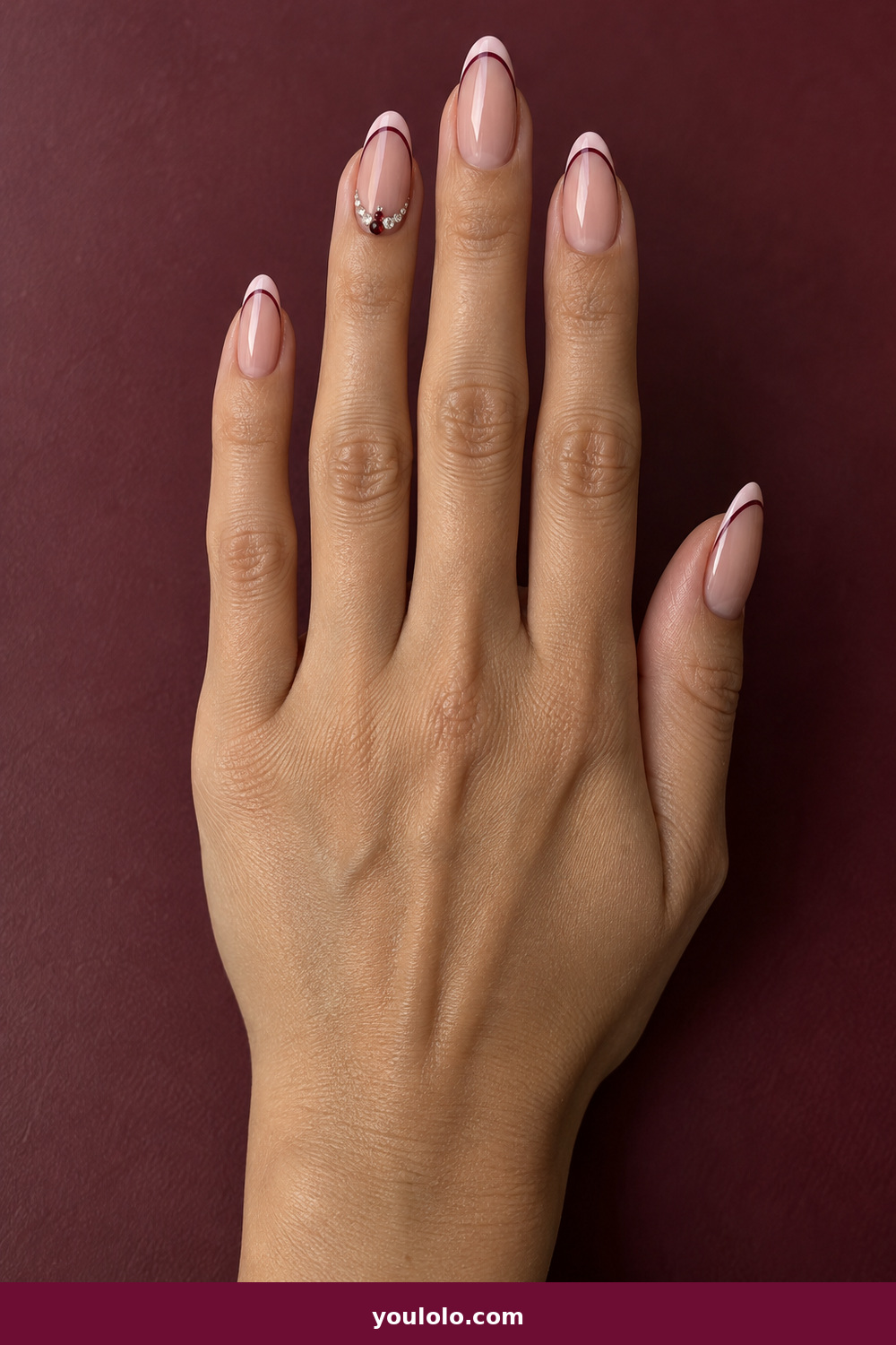 Pink Nails with Rhinestones on One Finger Ideas: Burgundy Pink Double French, Almond nails with blush and burgundy double-French lines plus a tiny garnet-and-clear crystal V on the ring finger.