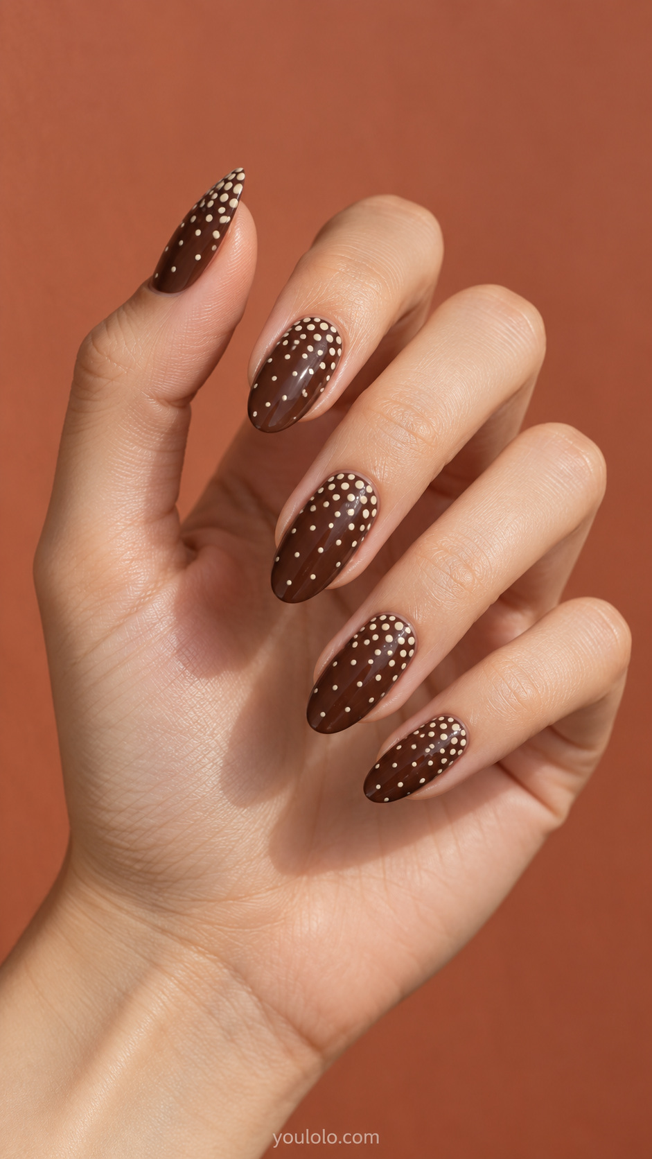 Cream dots fading from the base manicure