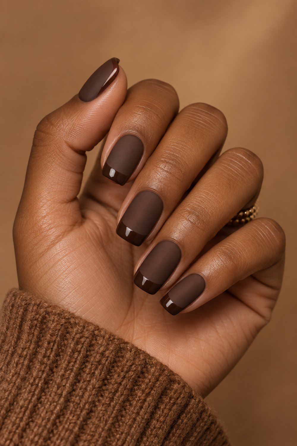 Tonal chocolate French nails with matte base and glossy tips
