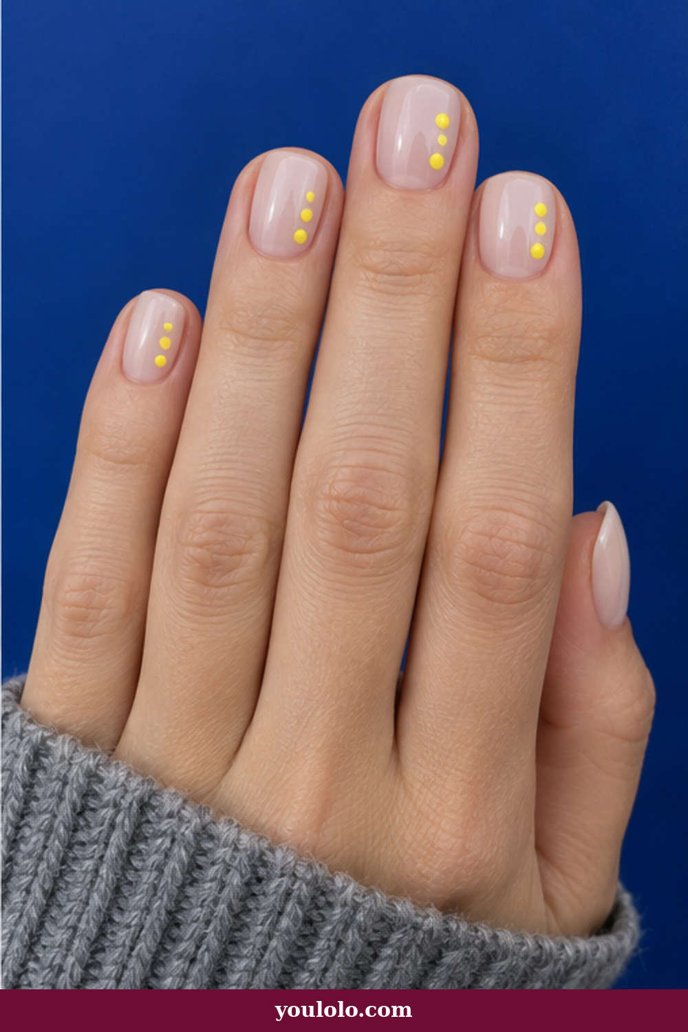 Lemon Nails idea 14: milky nude short nails with tiny asymmetrical lemon dots