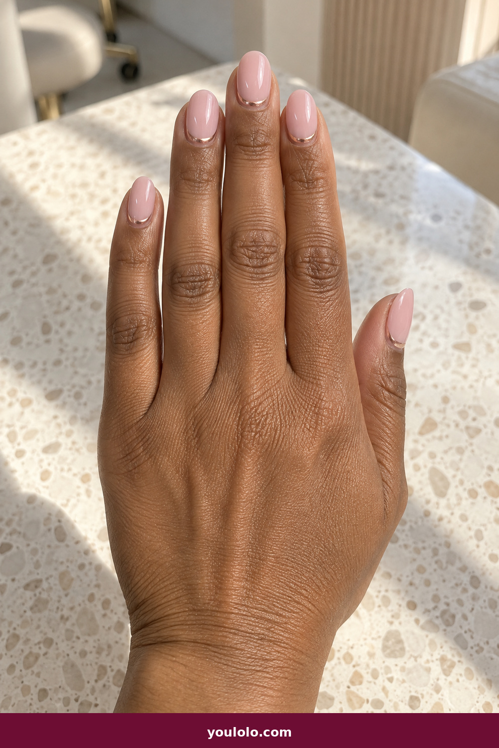 Gel Nails Ideas idea 14: Rose Gold Halo, medium oval blush gel with a thin rose-gold halo near the cuticle