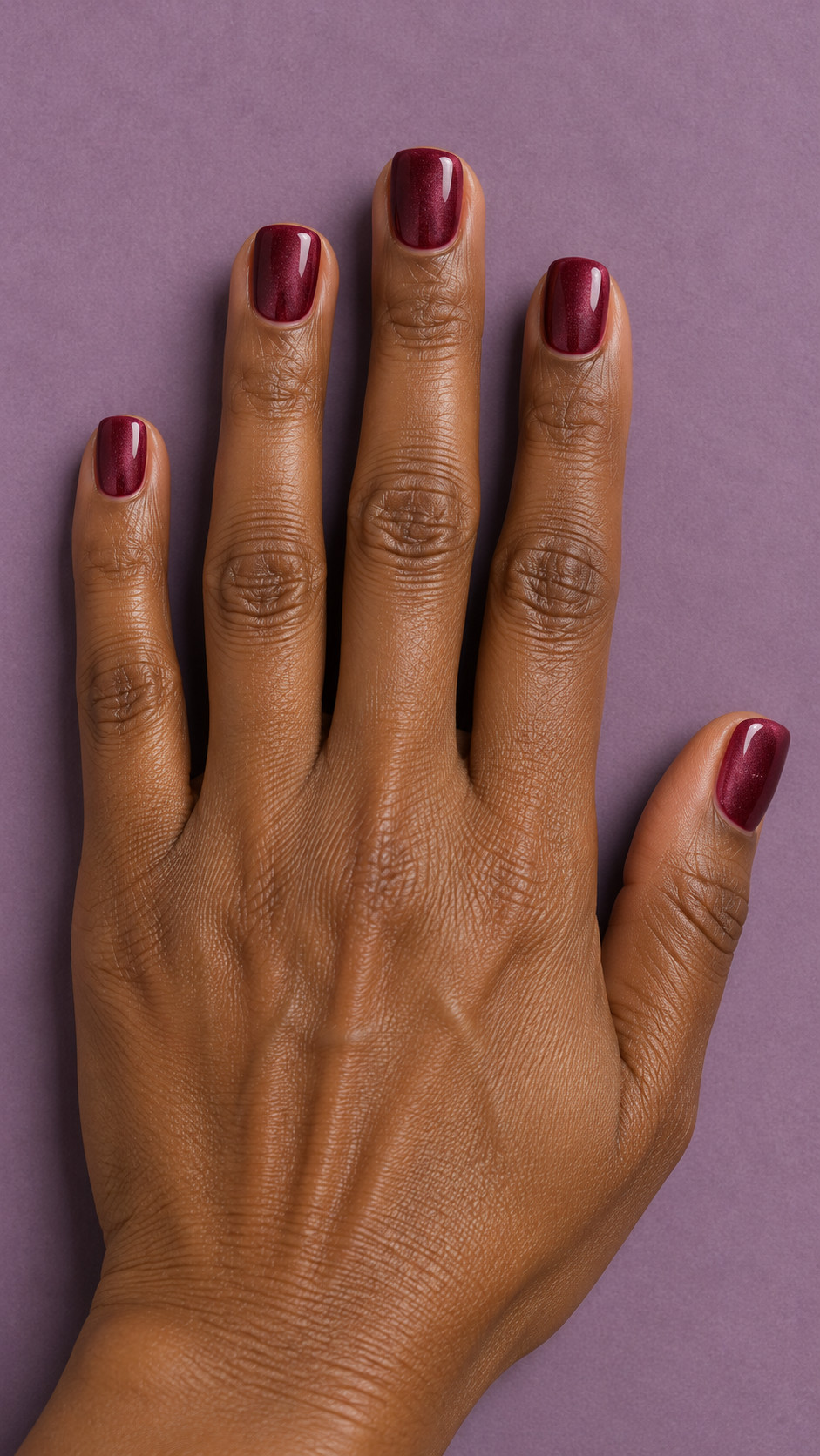 Velvet Nails idea 15: Berry Velvet Frame manicure on a realistic feminine hand