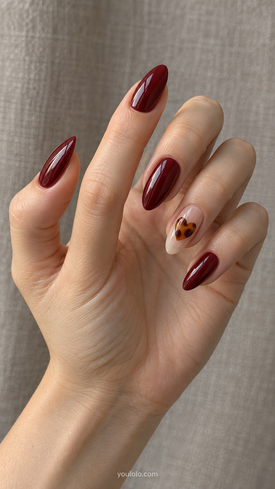 Burgundy with tiny amber hearts manicure