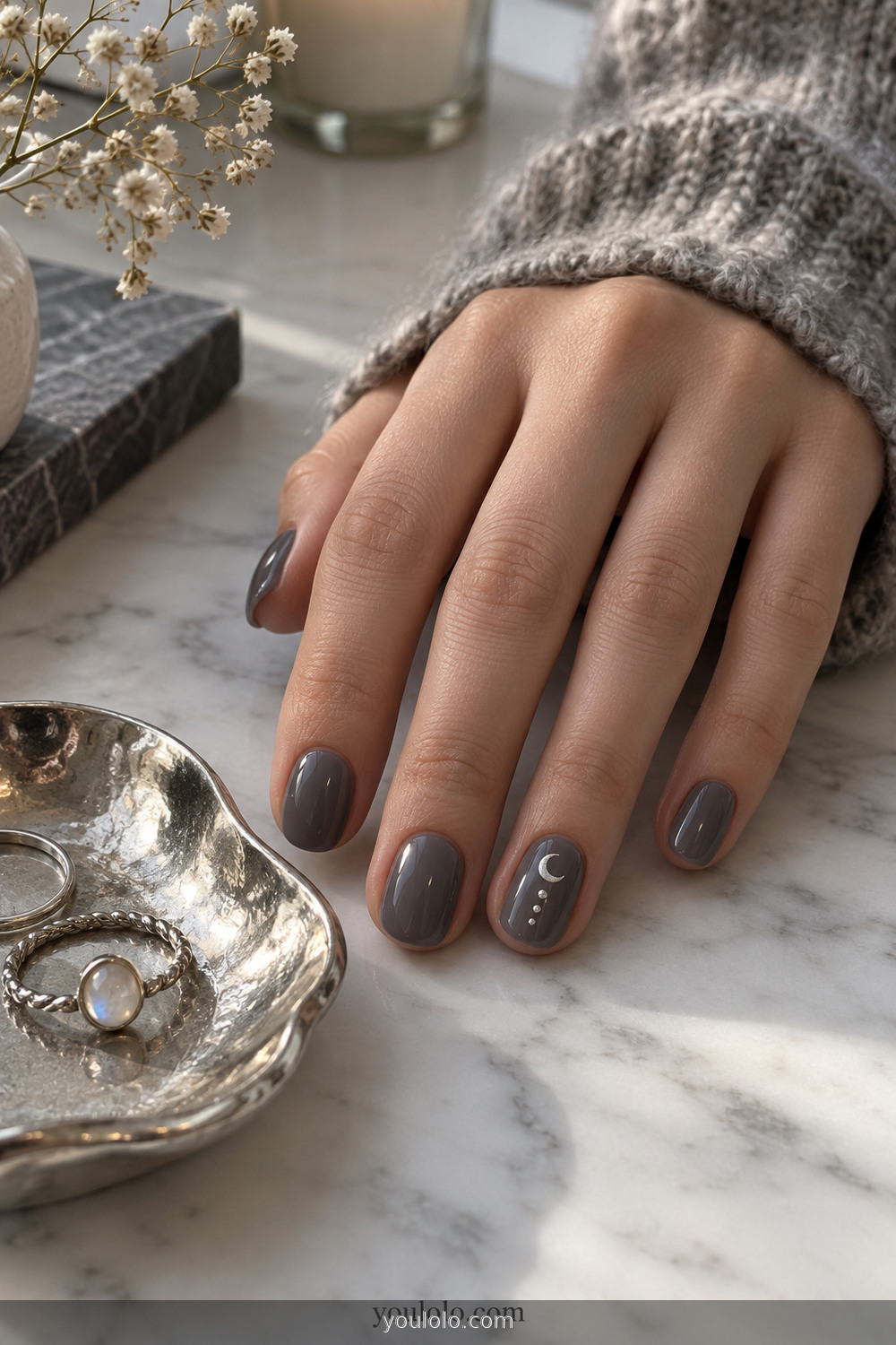 Smoky gray nails with silver crescent moon and dot accent