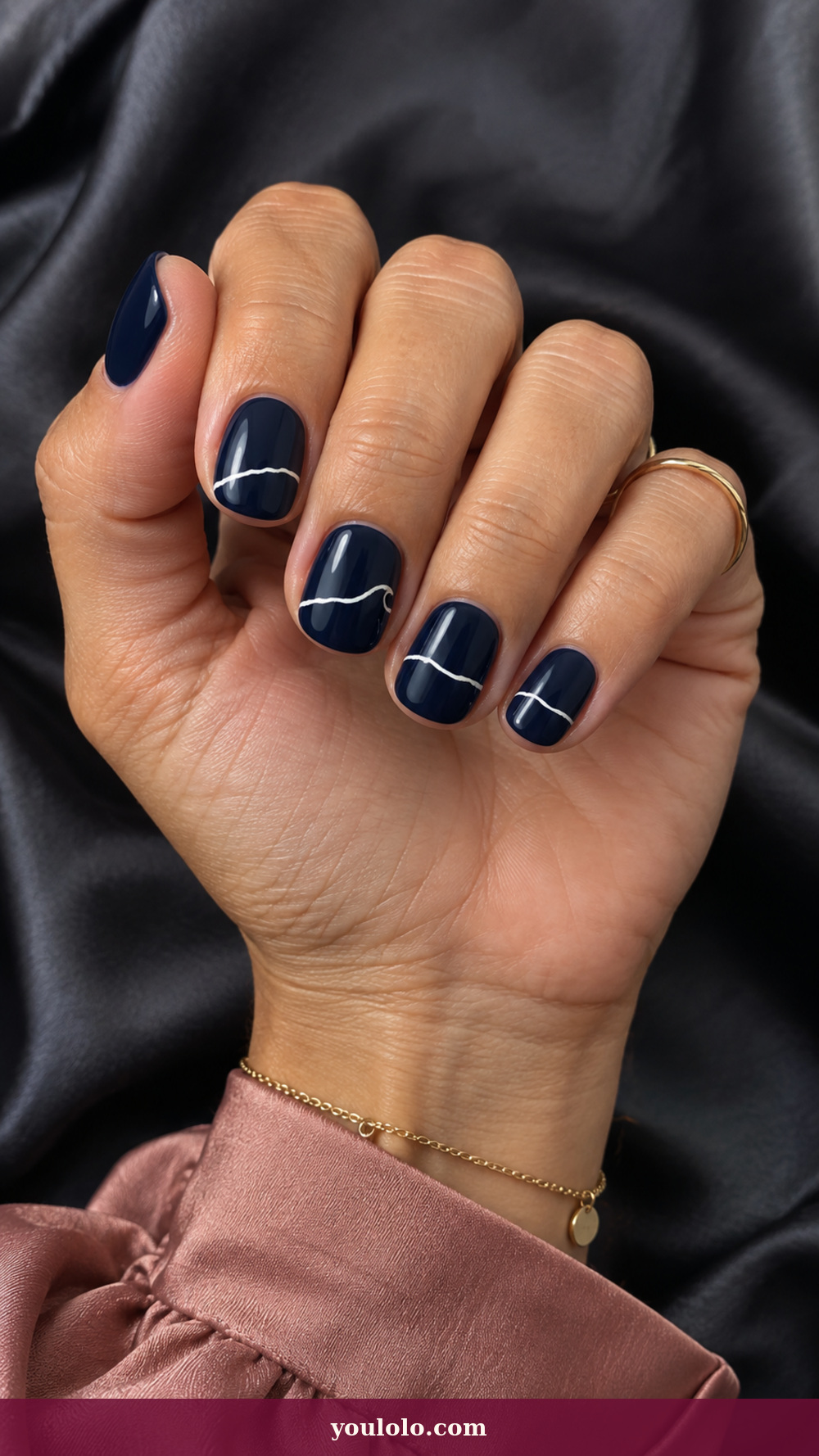 Blue and White Nails idea 15: Midnight Snowline on a realistic feminine hand