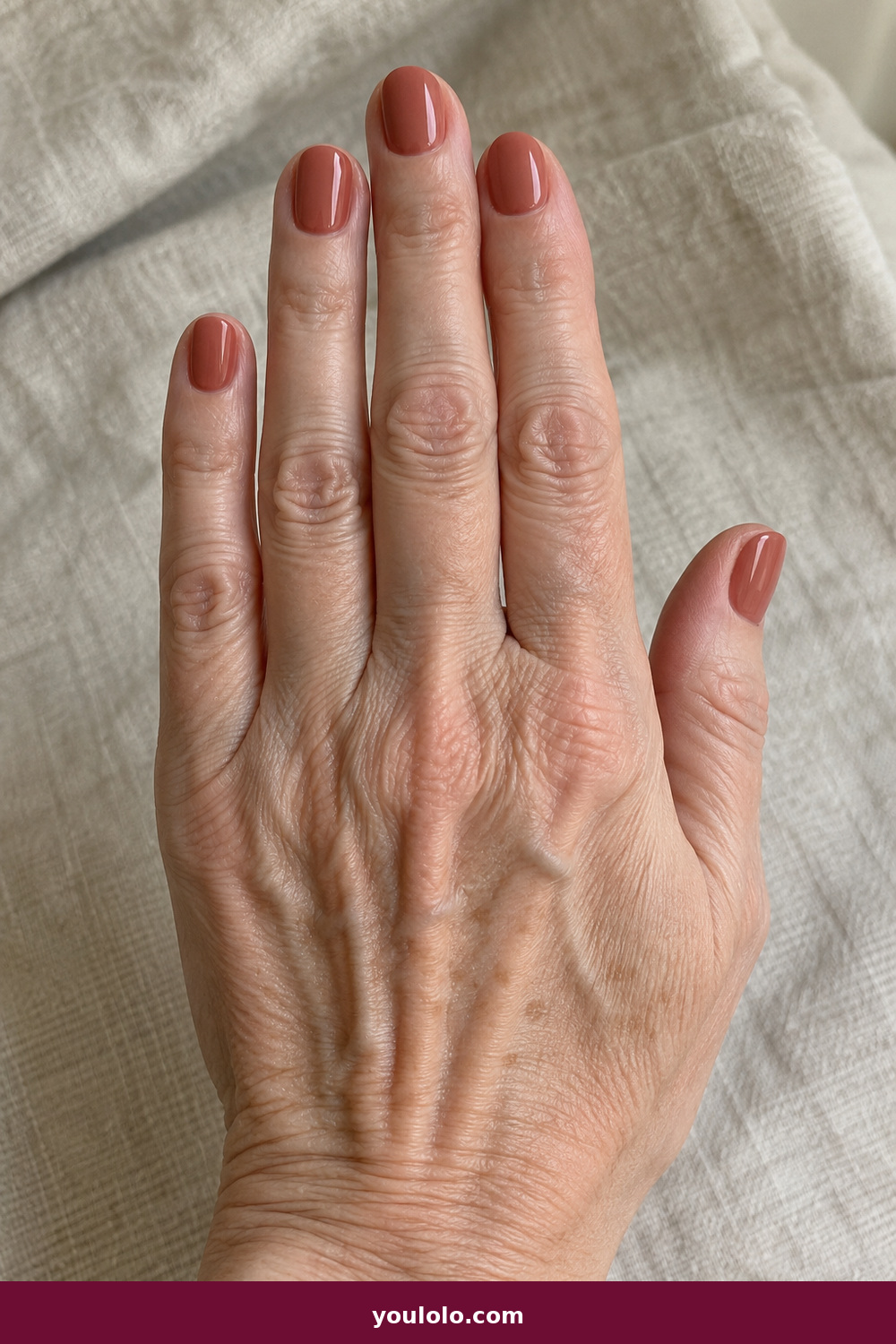 Work Nails idea 15: Muted Terracotta, short rounded nails in softened terracotta clay cream