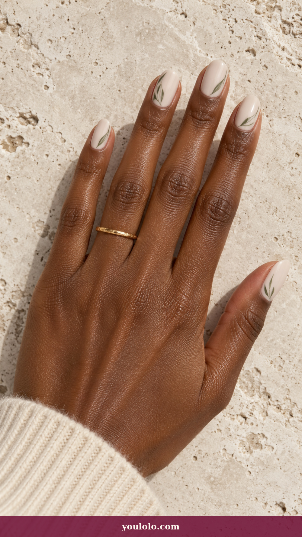 Simple Spring Nails idea 15: Pistachio Outline Leaf on a realistic feminine hand