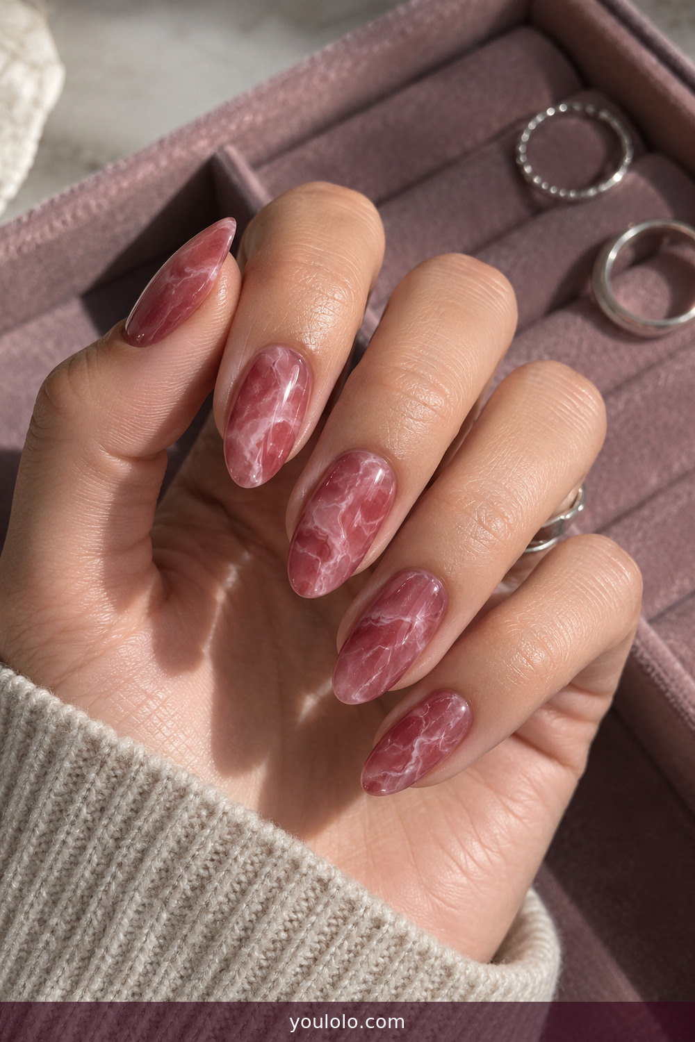 Translucent raspberry quartz marble almond nails