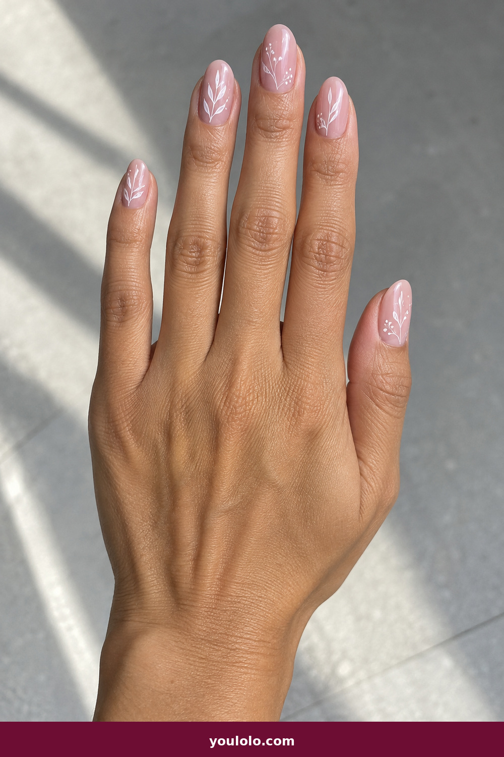 Pink and White Nails idea 15: White Botanical Line, medium oval dusty pink nails with fine white botanical line art