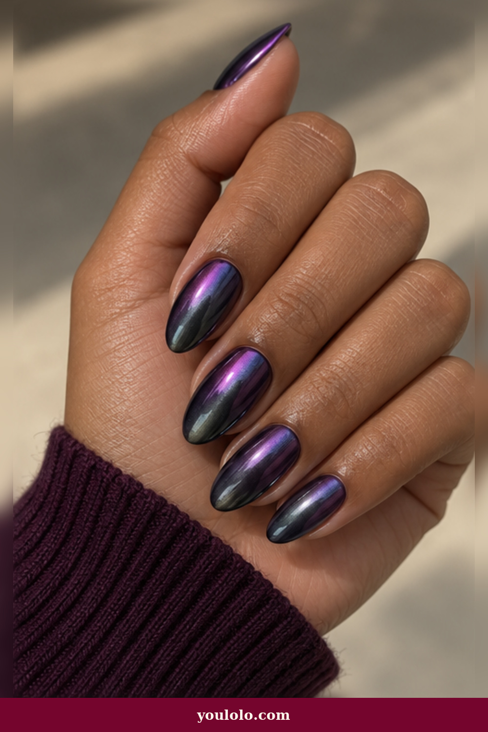 Emo Nails idea 16: amethyst chrome nails shifting through purple, pewter, and black