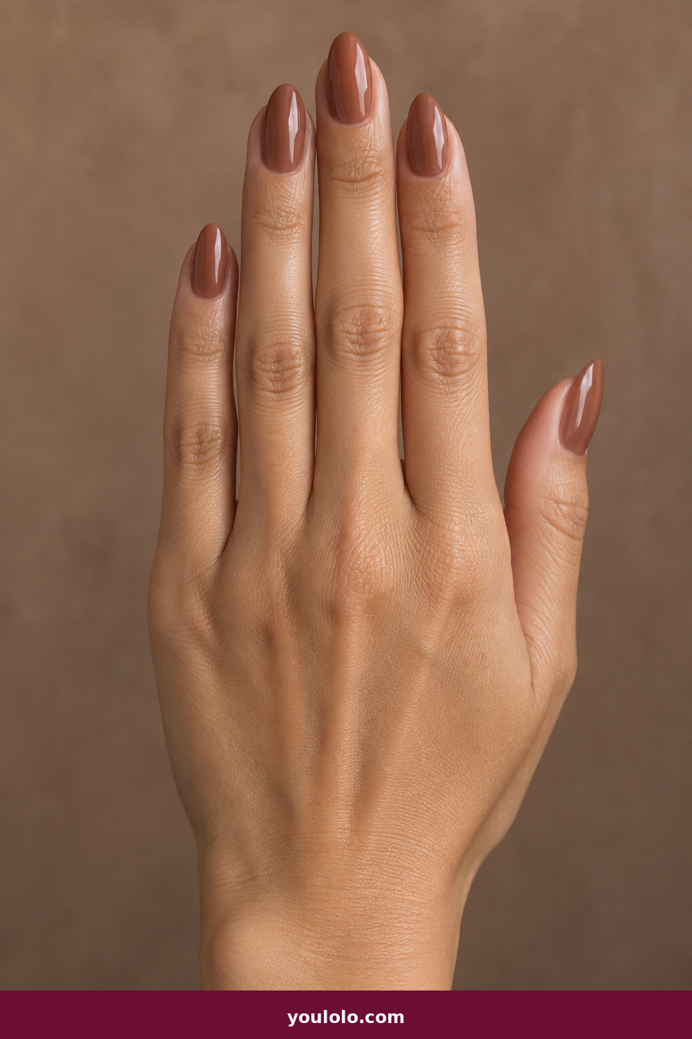 Elegant Almond Nails idea 16: Cinnamon Glaze, medium almond cinnamon brown nails with translucent glazed finish