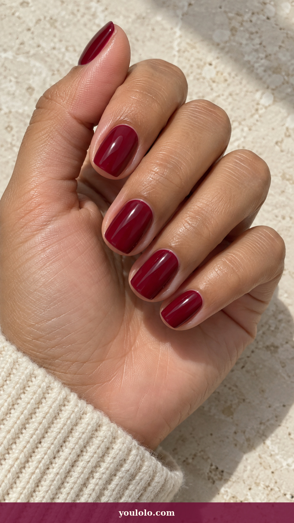 Princess Nails idea 16: Classic Cranberry Shorties on a realistic feminine hand