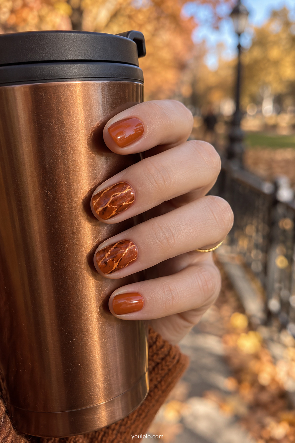 Burnt copper short nails with delicate gold glowing lines