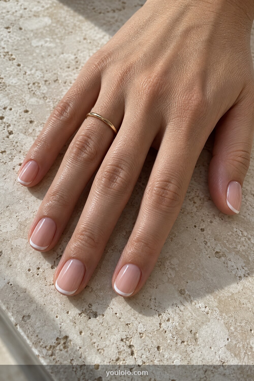 Ivory micro French tips on short oval nails