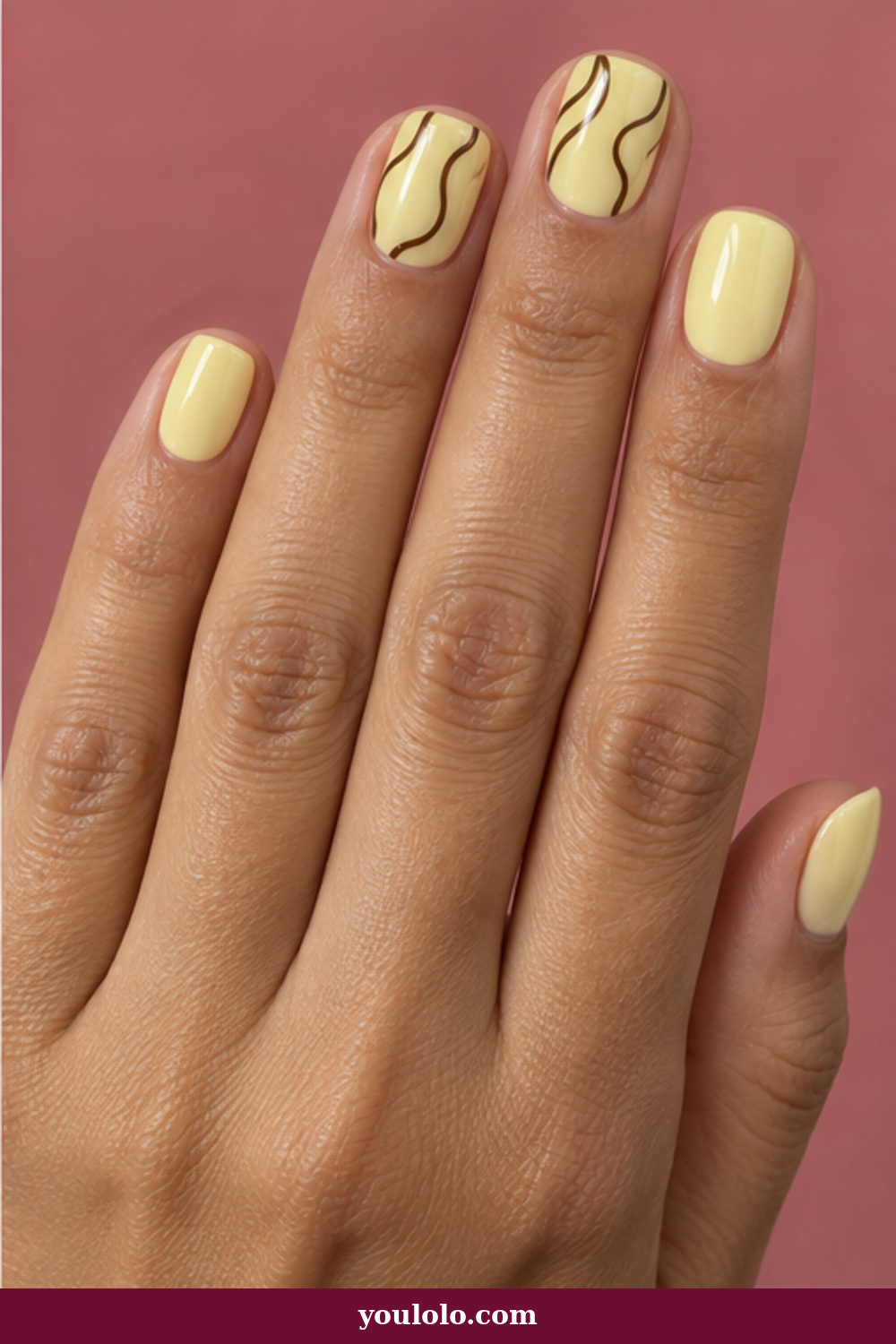 Lemon Nails idea 16: pale lemon nails with fine espresso contour line art