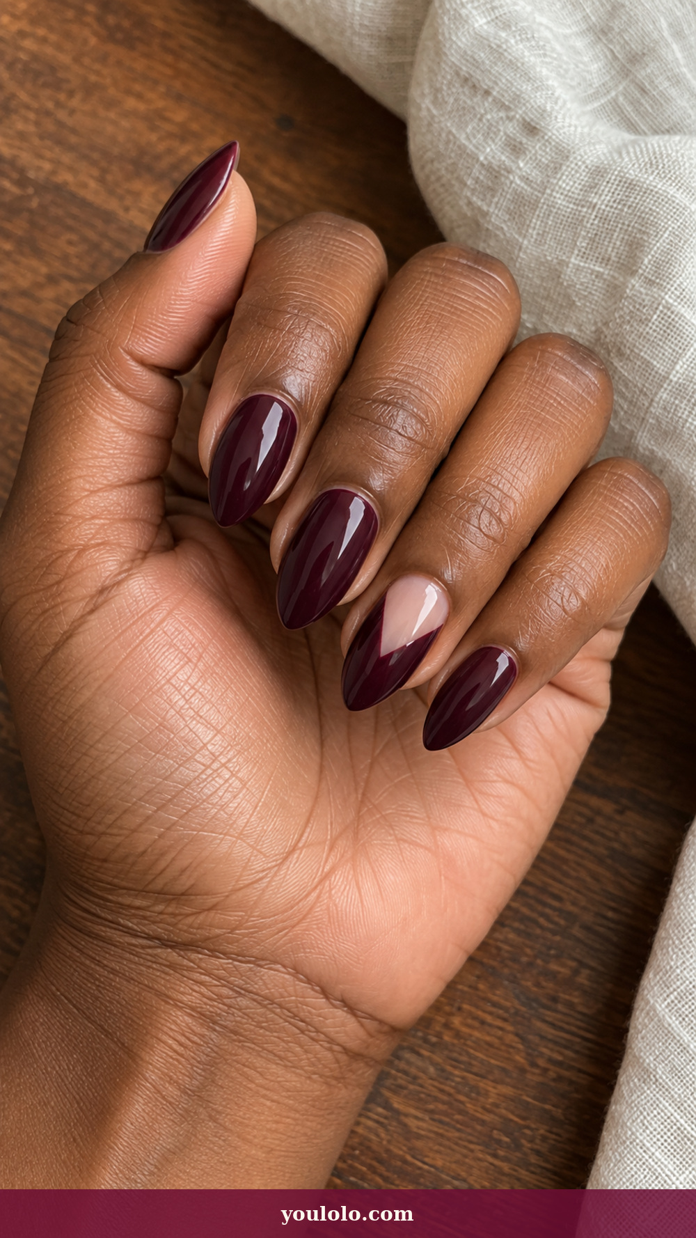 Short Stiletto Nails idea 16: Plum Negative Chevron on a realistic feminine hand