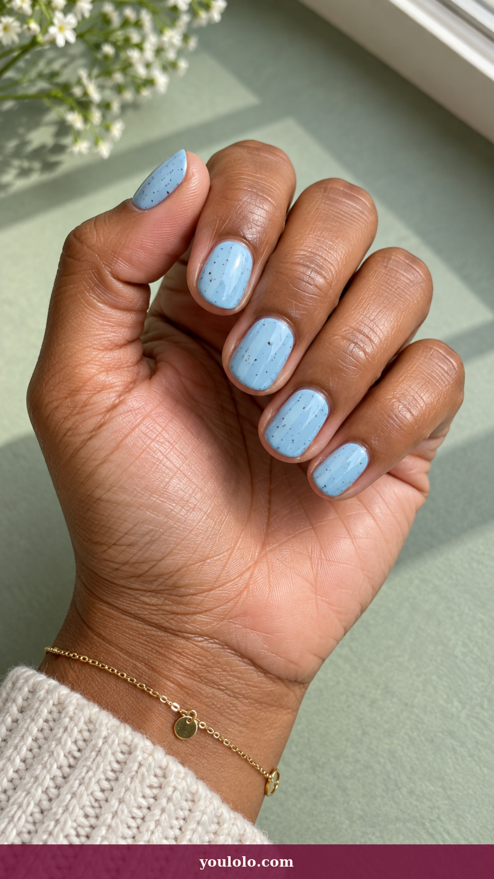 Simple Spring Nails idea 16: Robin Egg Shell on a realistic feminine hand