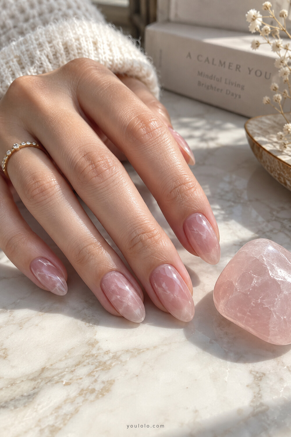 Rose quartz Korean syrup nails with cloudy white veining beneath pink gel