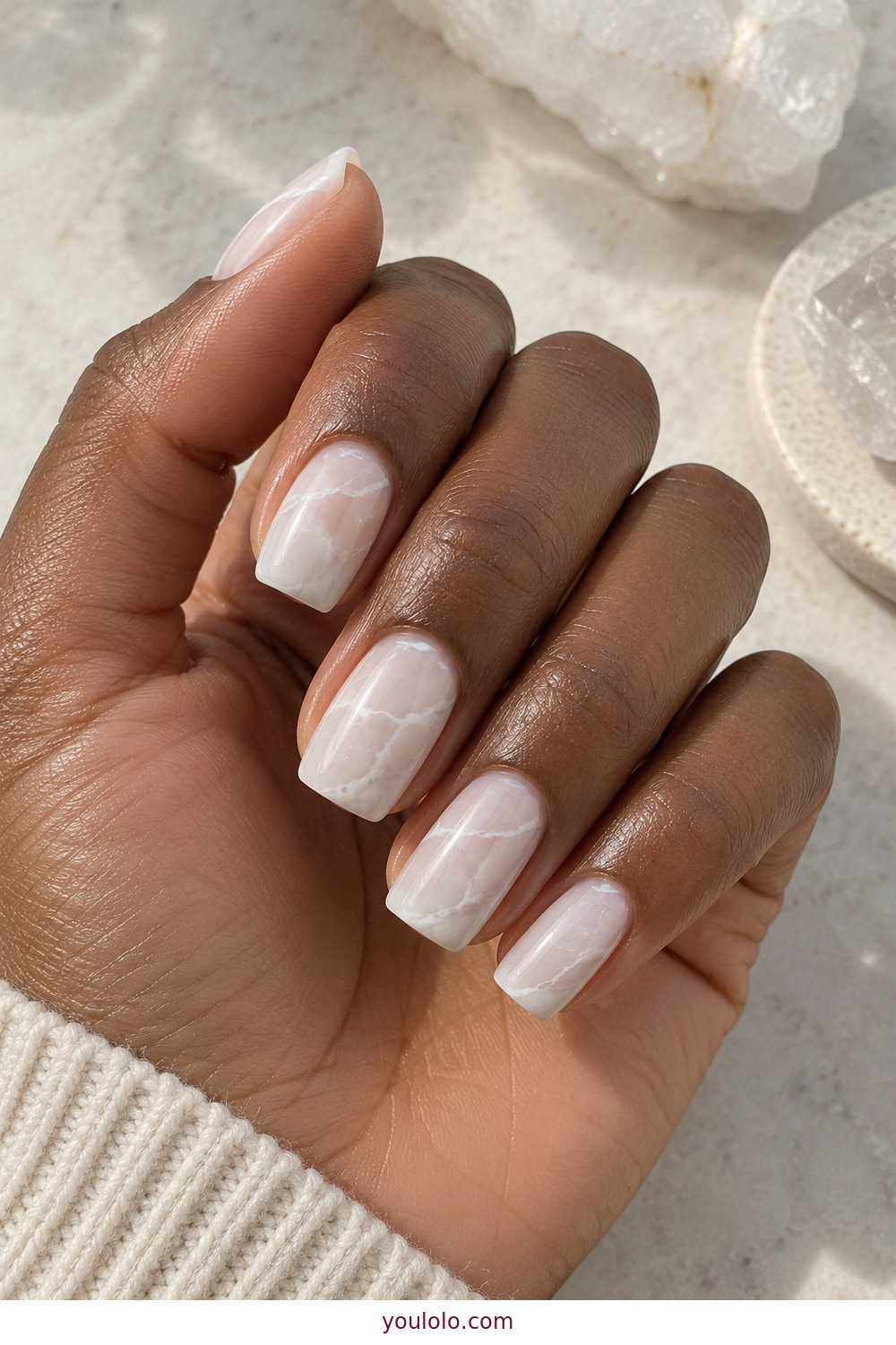 Soft translucent white marble design on square nails