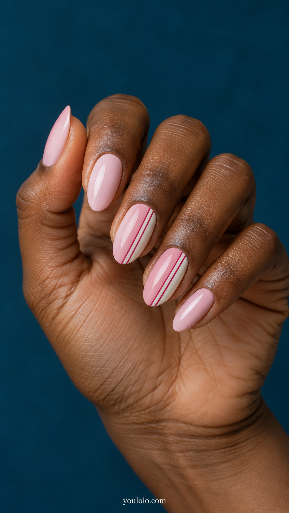 Broad pink blocks with fine pinstripes manicure