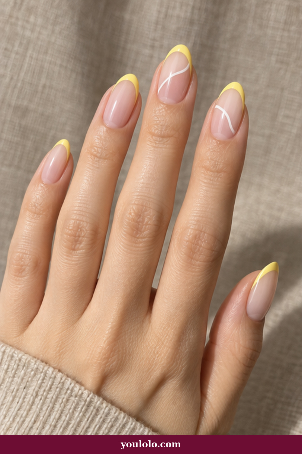 Lemon Nails idea 17: nude almond nails with lemon micro French and white ribbon lines