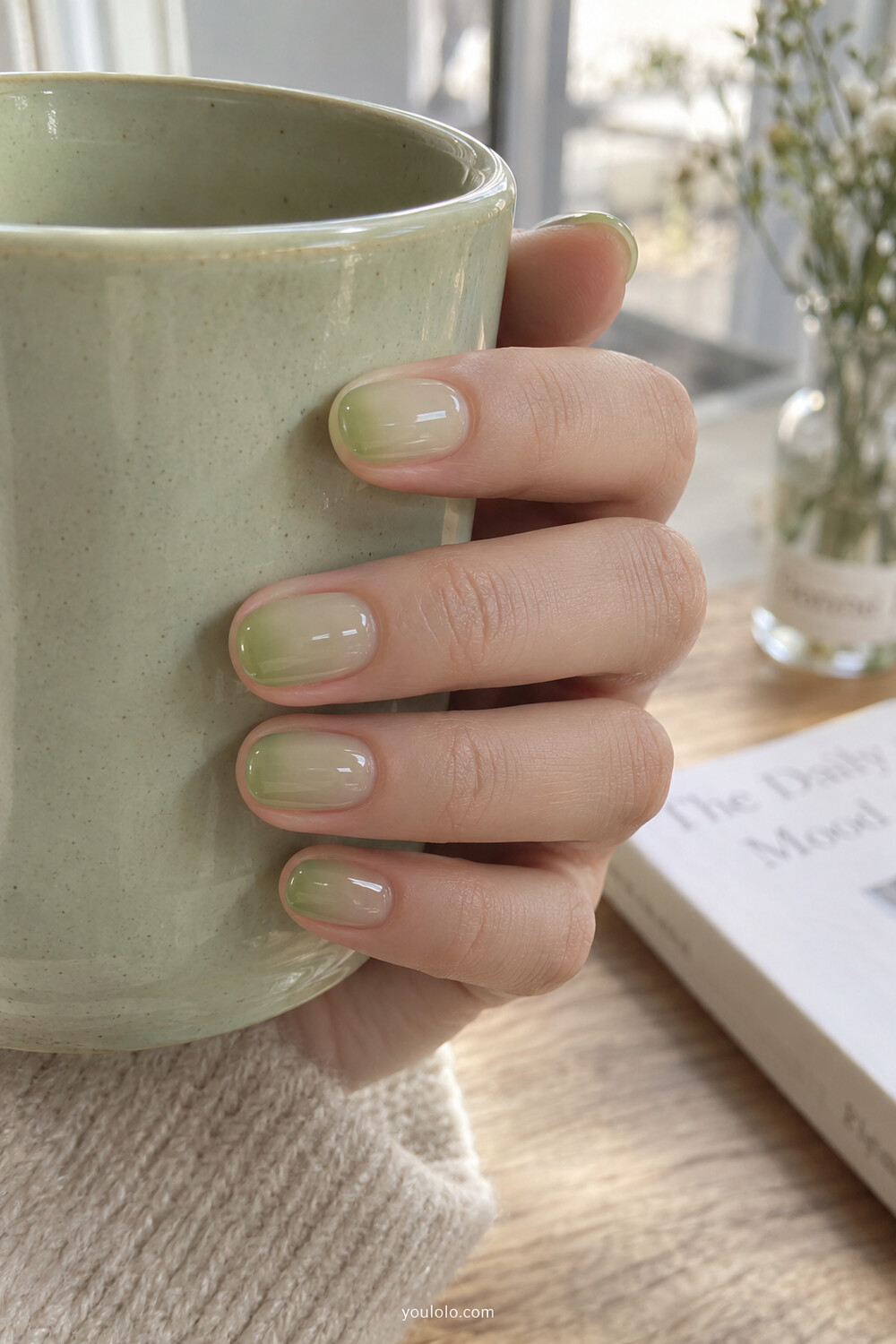 Translucent melon green Korean jelly nails on short rounded nails